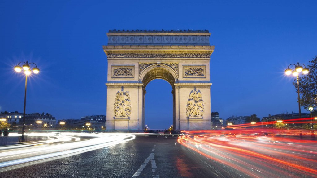 The famous Arc de Triomphe by night, Paris France