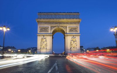 The famous Arc de Triomphe by night, Paris France